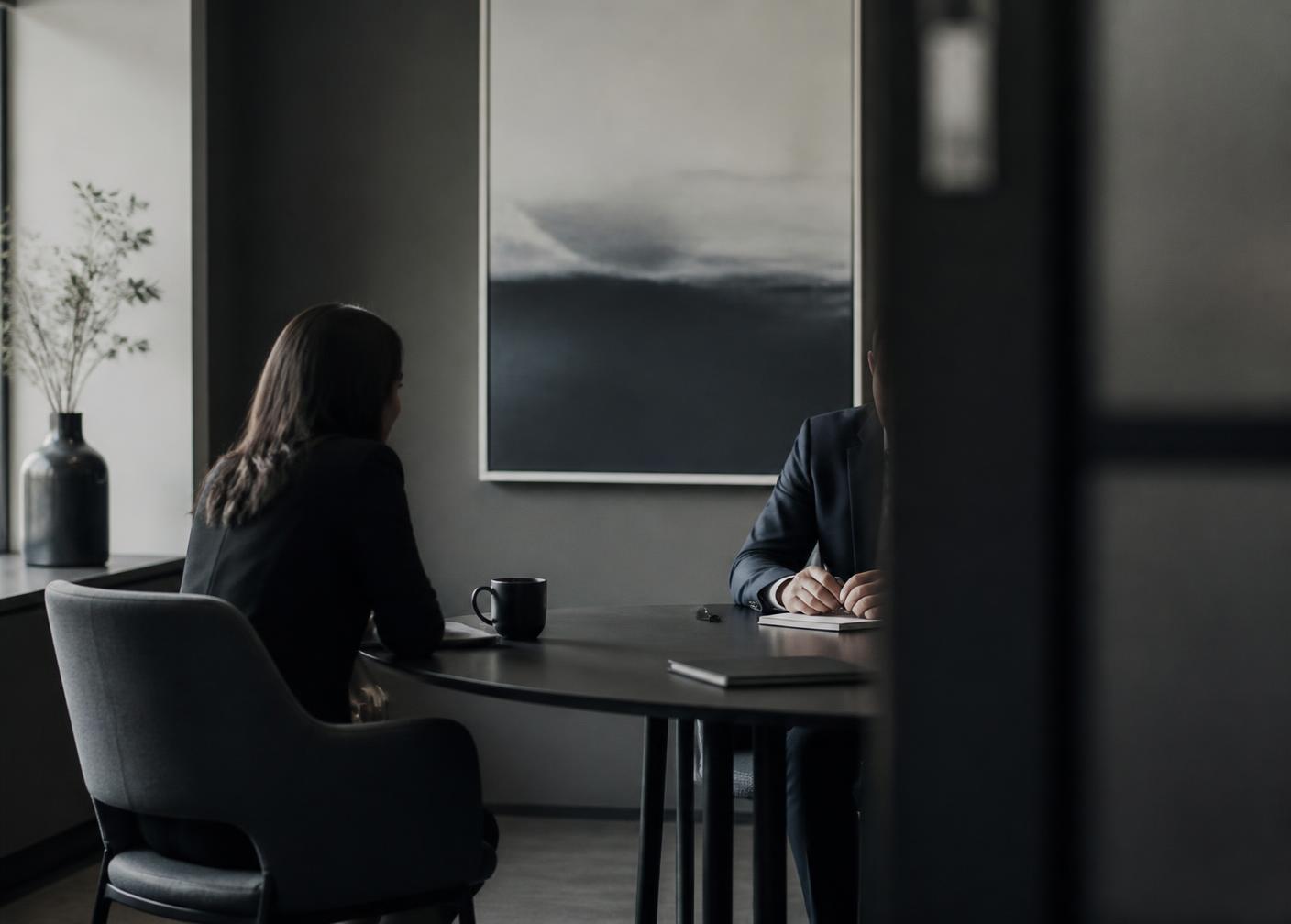 A strategic advisory conversation in a contemporary office